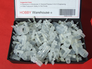 Elbow Connector for plastic tube and hose in a black display box.
