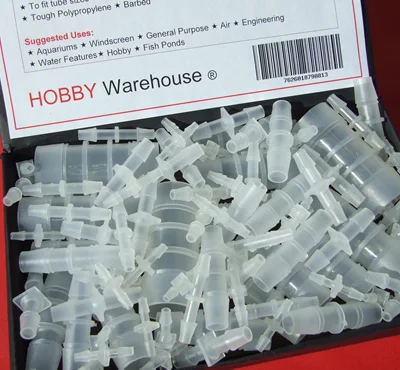 Plastic connectors in a black display box on a red background.