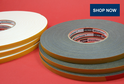PE foam tape (grey) and white tape on a cardboard insert on a red background.