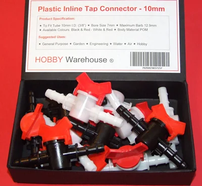 Plastic Taps in red/black and red/white in display box on a red background.