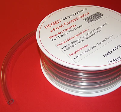 PVC Tube coil on a white spool/drum.